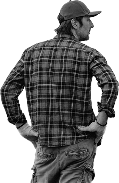 Farmer looking away from camera with plain shirt on isolated background